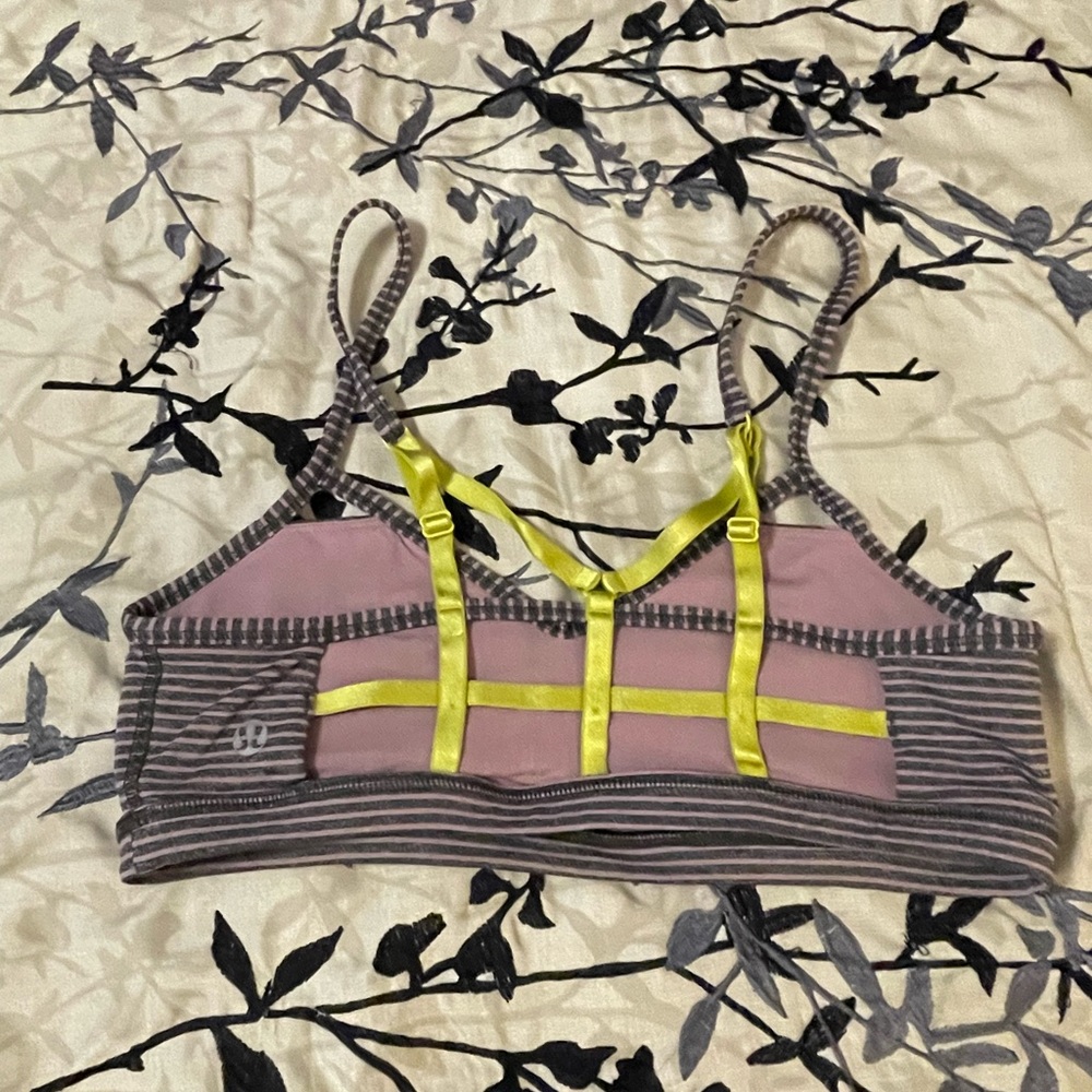 Lululemon sports bra. Pink grey excellent condition. Light support. Size 6